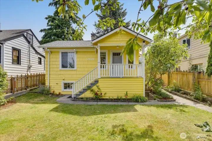 Welcome home to this beautiful 1918 Craftsman, perfectly situated on a generous lot and filled with natural light.