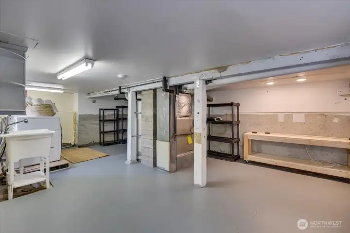 Good ceiling height in basement with laundry, extra storage