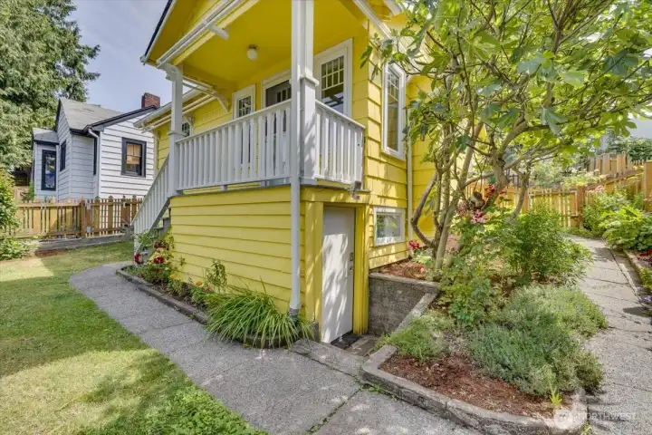 around the south cornner of the house into the back yard you will find detached studio.