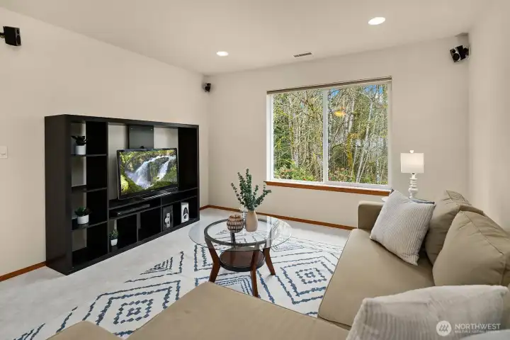A second angle of the living room showcasing the spacious layout, cozy neutral tones, and seamless flow — an ideal space for relaxing or entertaining guests.