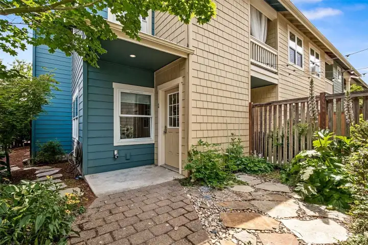 Like many Rainier Vista homes, the commonly used entry is from the alley side.