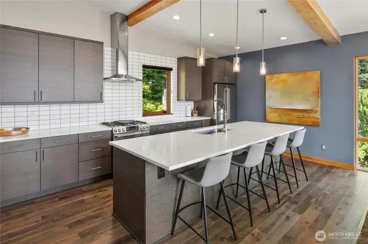 Open kitchen with large island with eating space