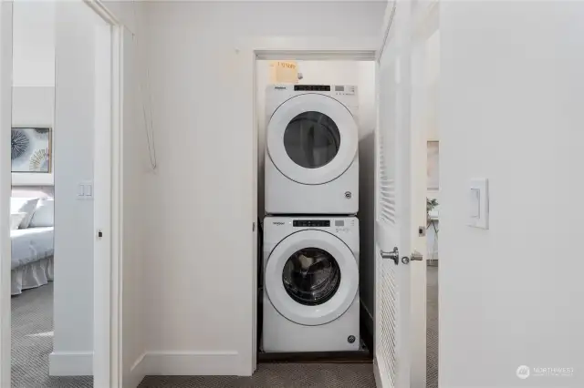 Laundry is between the primary suite and bedroom 2