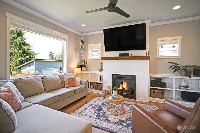 Cozy living room w/ integrated sound system and smart lighting features.