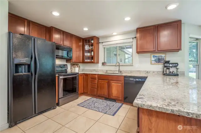 Nicely updated kitchen with granite counters