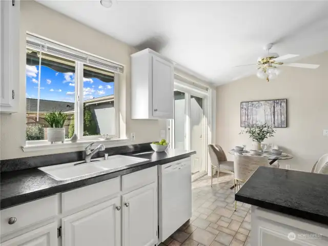 Do your dishes with a view of the back yard.