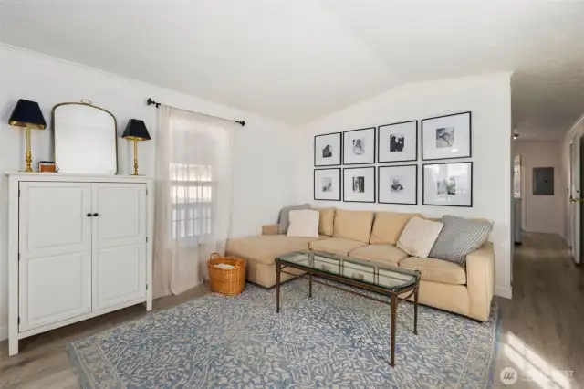 Living room, just inside the front door, the centerpiece of the home