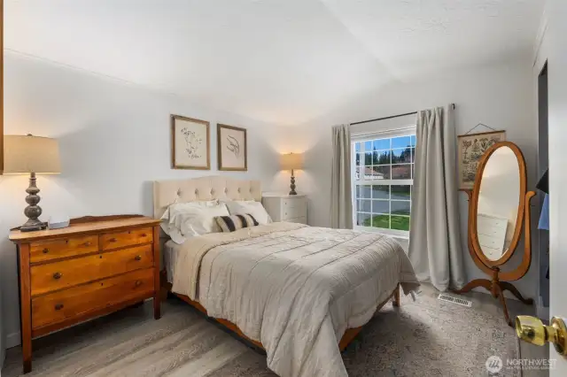 1st, larger bedroom easily fits furniture. Closet spans the wall.