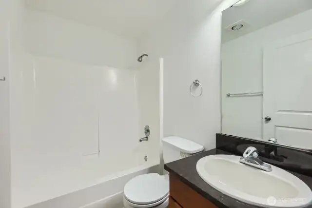 Full bathroom in hallway