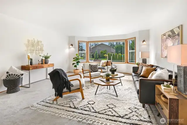 Large bay window overlooks the quiet street.