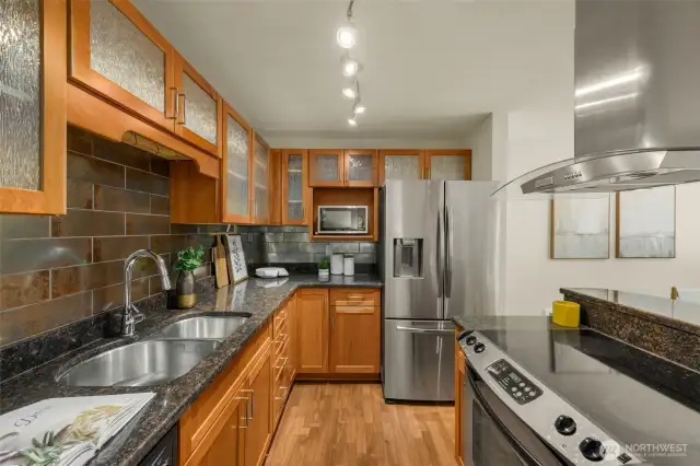 Spacious kitchen with granite countertops
