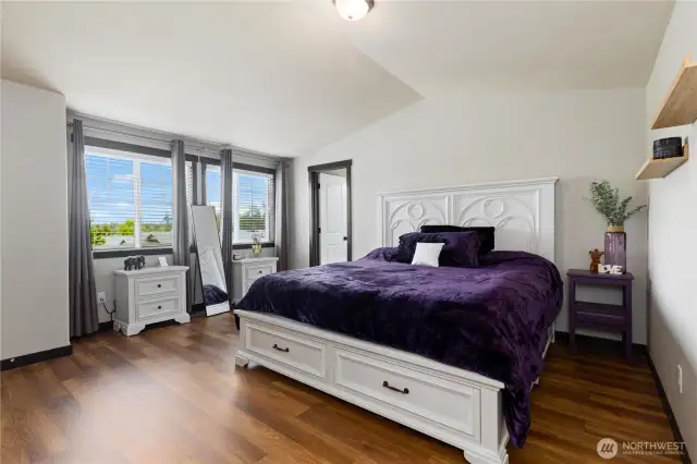 Primary bedroom with tons of natural light