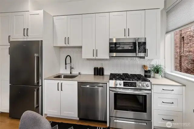Plenty of space in the kitchen, with added cabinets and counters to increase the storage and usability.