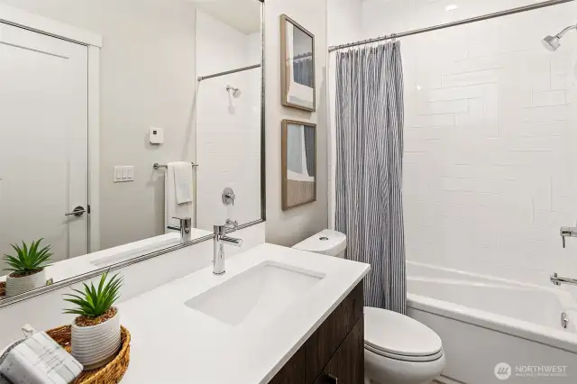 bathroom with plenty of storage.
