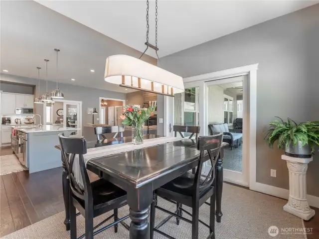 Dining Area with a View – Picture-perfect dining with expansive backyard and mountain vistas.
