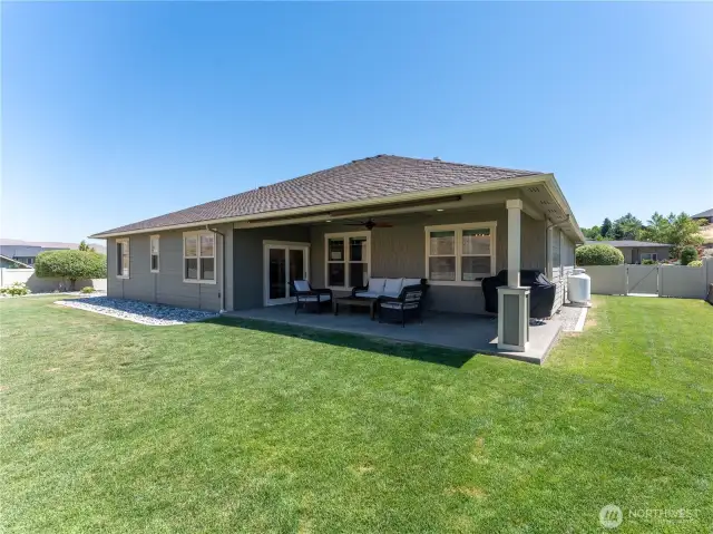 Covered Patio – Outdoor living space perfect for dining and relaxing.
