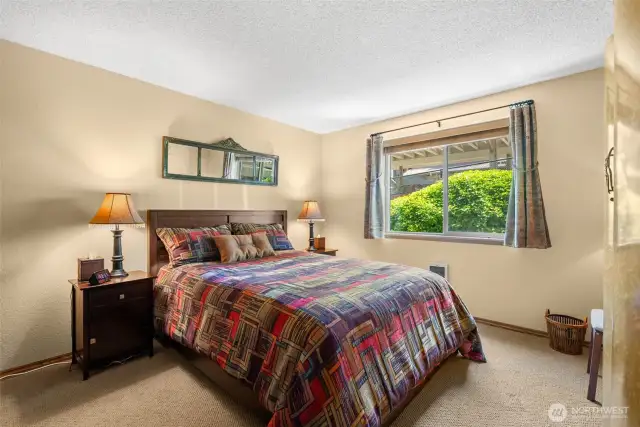 Master bedroom offers privacy and lots of natural light