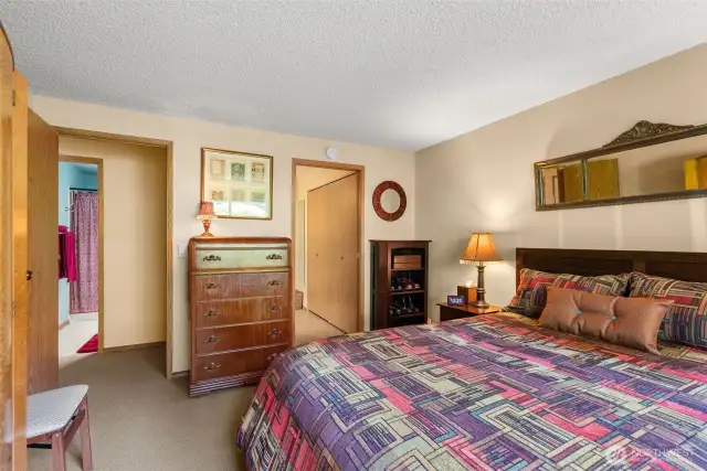 Master bedroom with ensuite bath and closet
