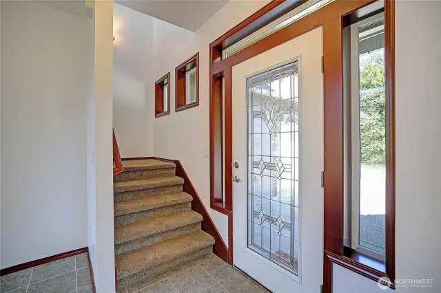going upstairs to (2) large bedroom, flex space and full bathroom