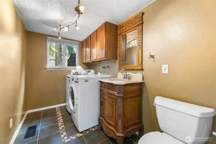 Half Bath and Laundry Downstairs