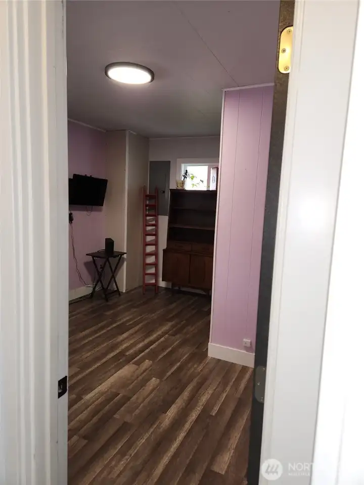 Second room downstairs.