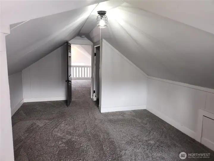 Plenty of space for a good sized bed and other furniture pieces in this bedroom.