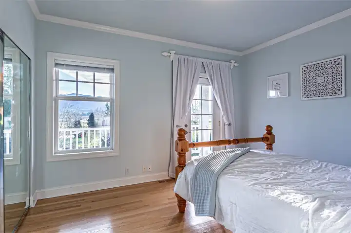 Bedroom 1 showing access to 2nd floor balcony