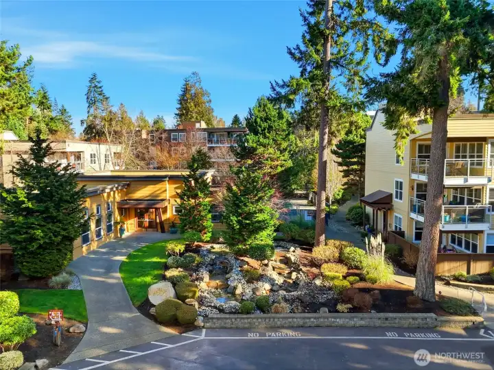 Desirable Sequoyah community featuring beautifully maintained grounds, secure lobby entry, elevator, outdoor pool, fitness room & clubhouse