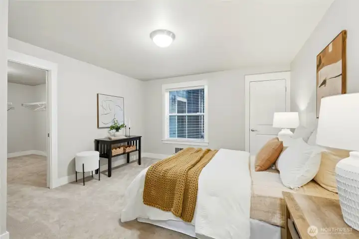 Bedroom with large walk in closet