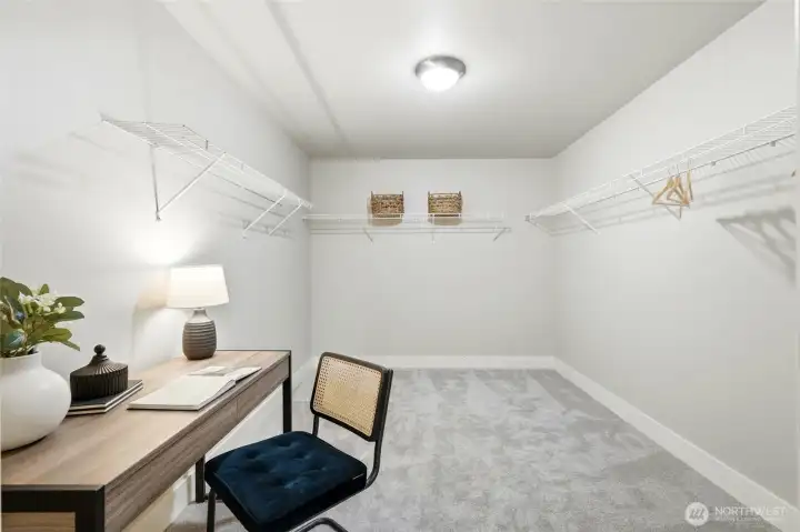 Huge walk in closet with plenty of room for work from home space or storage