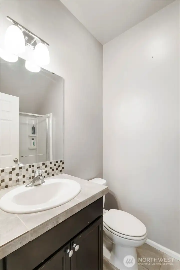 Attached ¾ bath on the main floor adds convenience and privacy.