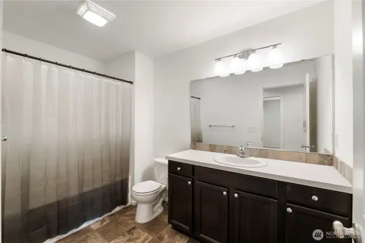 Well-designed bathrooms combine function and comfort for busy households.