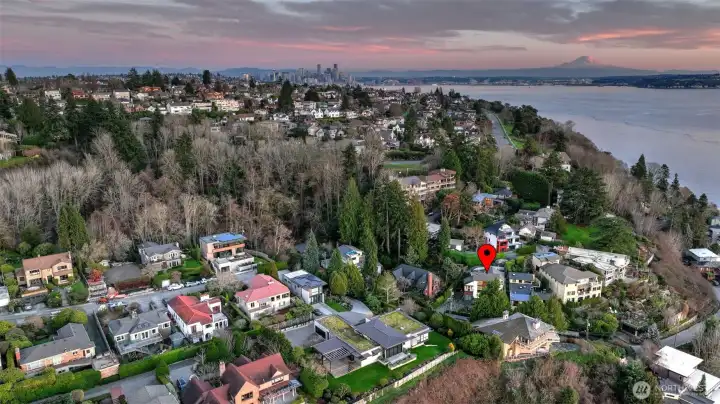 Aerial view of the neighborhood to show the amazing location. Just steps to beach access for morning walks and exploration.