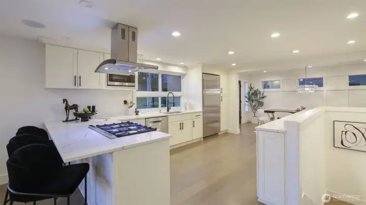 The dining room and kitchen flow seamlessly for easy entertaining.