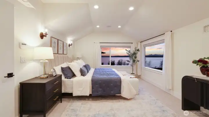 Spacious primary suite with picture-perfect sunset views.