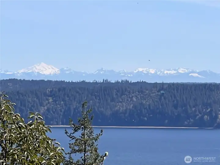 Views over Hood Canal with the Cascade Mtns in view on a clear day. Views over Hood Canal with the Cascade Mtns in view on a clear day.