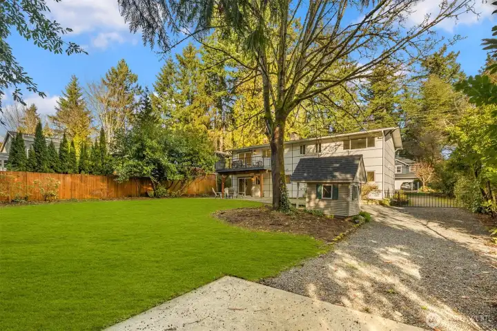 Large level fenced/gated backyard with room for boat/rv parking