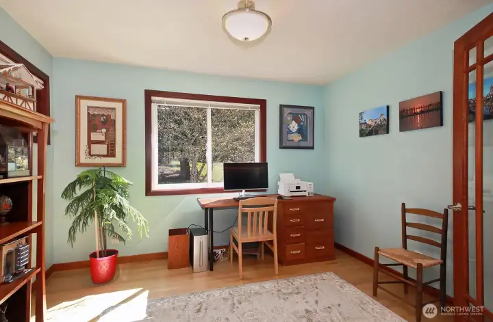 Conveniently located office with hardwood floors and tons of light! Take your time to appreciate all the craftsmanship throughout this home.