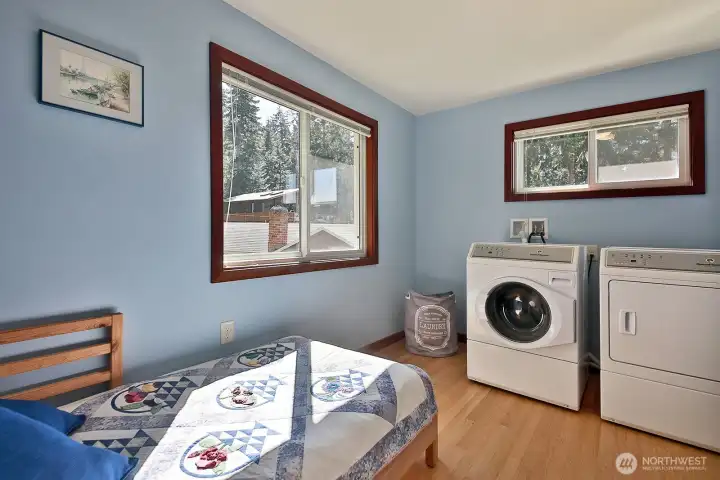 This is your spacious main level laundry room. There's enough space in here for extra sleeping space!