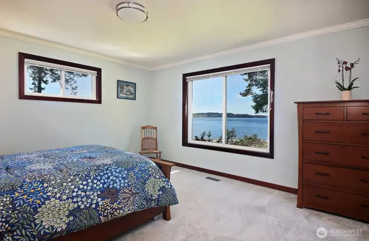 Another big window to remind you of the beauty that surrounds you. There is another dresser to your back (not in photo). There is plenty of space for a sitting area in this bedroom if you so choose.