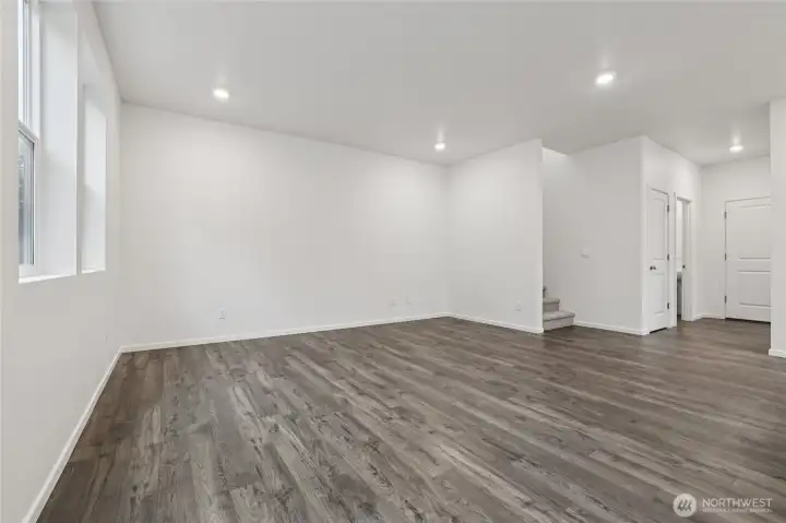 Open space throughout the downstairs.   Pictures are for representational purposes only, colors and features may vary.