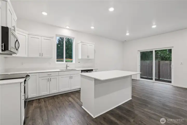 Island is large enough to bar stools.   Pictures are for representational purposes only, colors and features may vary.