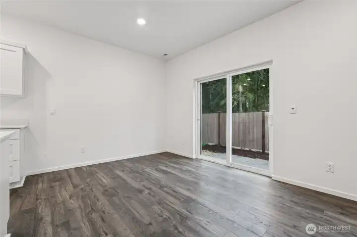 Dining area off kitchen.   Pictures are for representational purposes only, colors and features may vary.