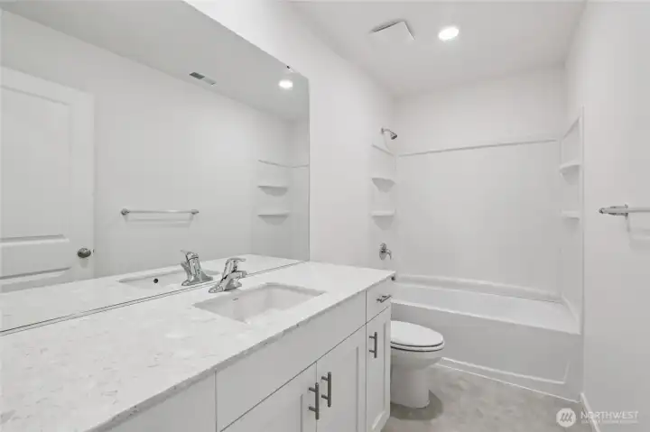 Secondary bathroom upstairs.  Pictures are for representational purposes only, colors and features may vary.