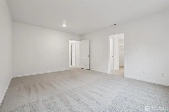 Primary bedroom.   Pictures are for representational purposes only, colors and features may vary.