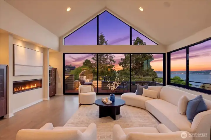 Cathedral ceilings, triangular clerestory glass, and Puget Sound views make this living room one of the most dramatic spaces in West Seattle.