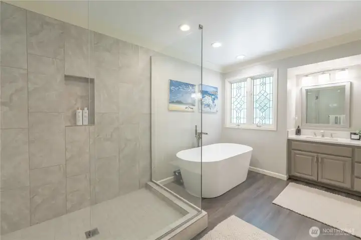 Walk-in shower, large tub.