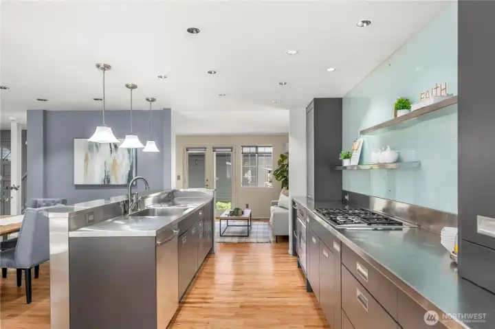 The beautifully remodeled chef's kitchen is designed for both everyday living and entertaining