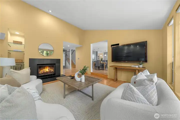 The elegant gas fireplace anchors the room