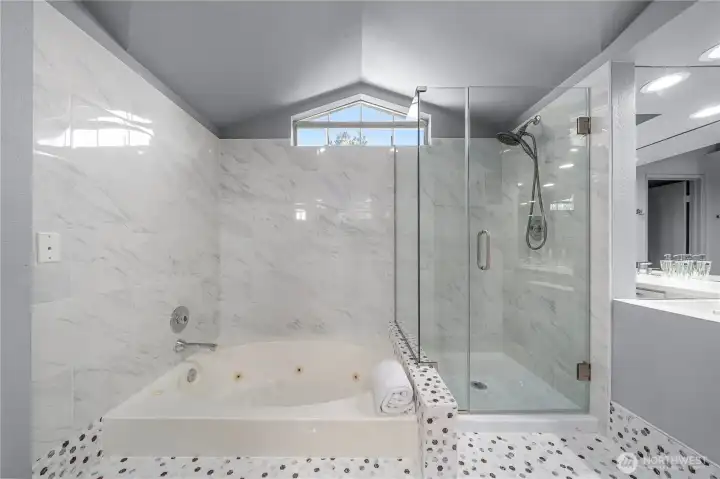 Beautifully updated oversized walk-in shower &soaking tub.